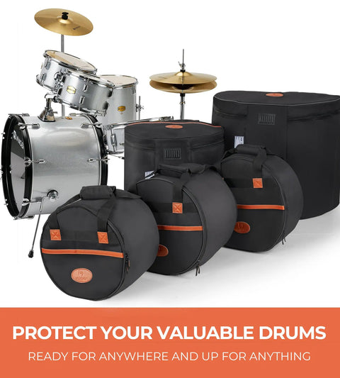 Road Tough Full Size Five Piece Drum Case Set With Killer Thick Padding For 10 Inch 12 Inch Toms 14 Inch Snare 16 Inch Floor Tom And 22 Inch Bass Drum Bags, durable black bags beside a silver drum kit.