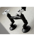 Close-up of Vintage Center Wall Mount Kitchen Faucet In Matte Black With Adjustable Center Spacing From 3.5 To 8.5 Inches.