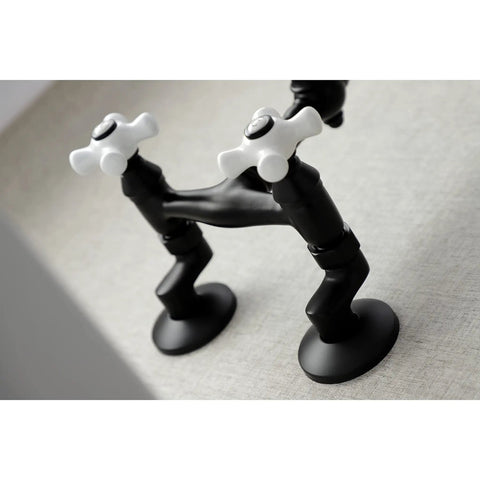 Close-up of Vintage Center Wall Mount Kitchen Faucet In Matte Black With Adjustable Center Spacing From 3.5 To 8.5 Inches.