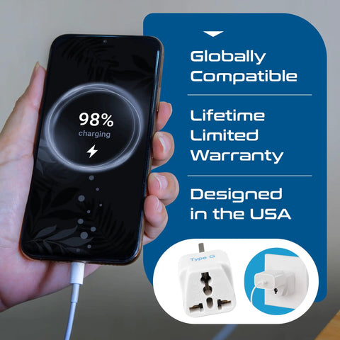 Person holding phone with 98% charging, text highlights global compatibility and lifetime warranty beside Grounded Type G Travel Plug Adapter Set 3 Pack For UK Ireland Hong Kong UAE And More Universal Compatibility For Most Sockets Small Compact Travel Size White The Ultimate Travel Hack For International Trips.
