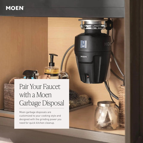 Under-sink Moen garbage disposal paired with Camerist One-Handle Pullout Kitchen Faucet With Reflex Docking And Power Clean Spray