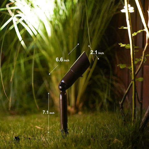 Single spotlight from 8 Pack Low Voltage Landscape Lighting Kit That Lights Up Your Yard, 3W LED Bulbs, showing 7.1 inch height in garden.