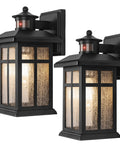 Legit Heavy Duty Motion Sensor Outdoor Wall Lights 2 Pack Featuring Dusk To Dawn Smart Settings And Hecka Bright Detection For No Nonsense Patio Security And Curb Appeal Boost, black lamps with textured glass.