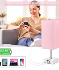 Woman using Pink Touch Control Table Lamp With 3 Way Dimmable Brightness And USB A And USB C Ports, White Base Modern Nightstand Light