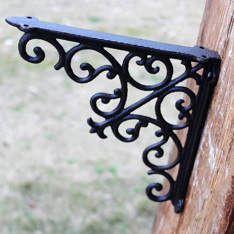 Built Tough Heavy Duty Cast Iron Wall Shelf Brackets Rust Proof 90 Degree Corner Braces detailed view of ornate black metal bracket.