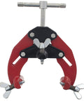 Front view of a PDQ pipe clamp with red jaws, black mounting plate, wing-nut ends, and a top T-handle screw.