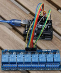 8 Channel 5V Relay Module with Optocoupler connected to Arduino Uno R3, featuring 10A relays, for home automation projects.