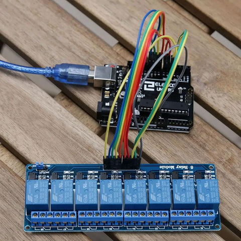 8 Channel 5V Relay Module with Optocoupler connected to Arduino Uno R3, featuring 10A relays, for home automation projects.