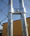 18 Piece Chain Link Fence Clamps Set For Dog Kennels 1 3 8 Inch Galvanized Steel Easy Install For Pipe And Panel Frames Rust And Corrosion Resistant Construction showing clamp installed on pipe.