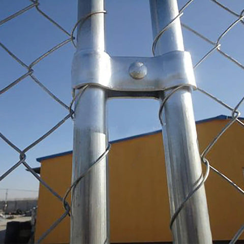 18 Piece Chain Link Fence Clamps Set For Dog Kennels 1 3 8 Inch Galvanized Steel Easy Install For Pipe And Panel Frames Rust And Corrosion Resistant Construction showing clamp installed on pipe.