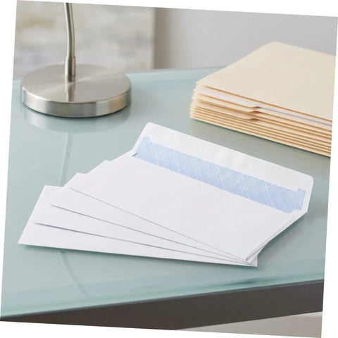 White 100 Pack Self Seal Envelopes With Peel And Seal Privacy Protection for letter size mail on glass desk