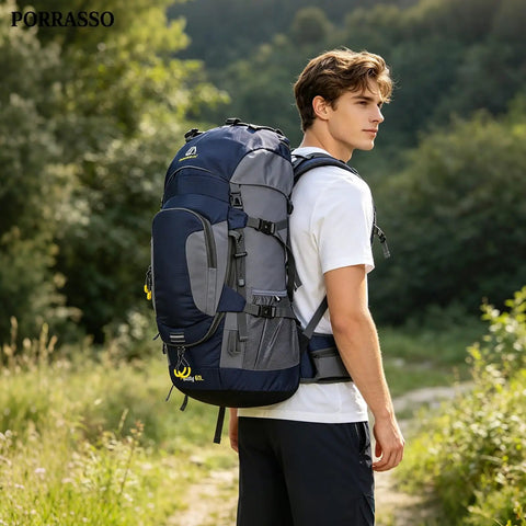 Person hiking with 60L Waterproof Hiking Backpack With Rain Cover Heavy Duty Nylon Daypack Rucksack For Camping And Travel, outdoors