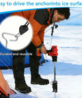 Person using Fourteen Piece Ice Fishing Anchor Tool Kit With Drill Adapter on ice to secure a tent.