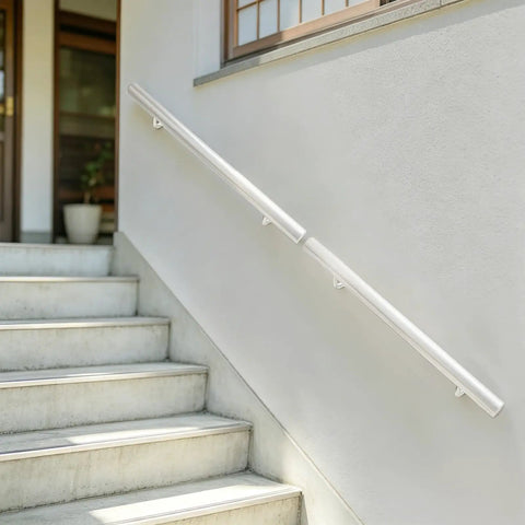 Rock Solid Wall Mounted Stair Handrail Forged From Premium Stainless Steel With Scratch Resistant Finish For Heavy Duty Support Up To Two Hundred Pounds And No Sweat Indoor Installation Today on white wall by stairs.