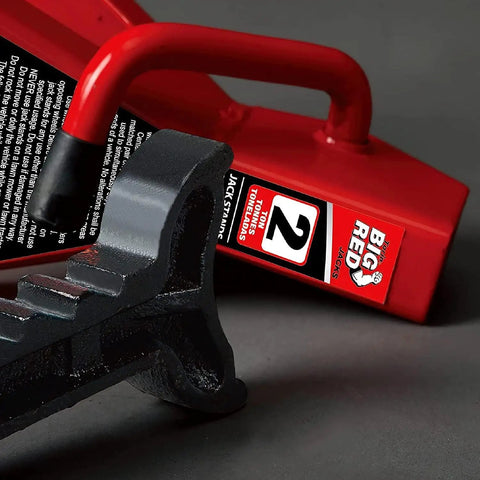 Close-up of a red 2 Ton Jack Stands For Cars And Sedans Beefy Heavy Duty Steel Lift Supports with durable top surface.