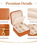 Super Chic Travel Jewelry Box With Waterproof PU Leather Exterior And Soft Flannel Interior Removable Dividers showing smooth leather and velvet lining.