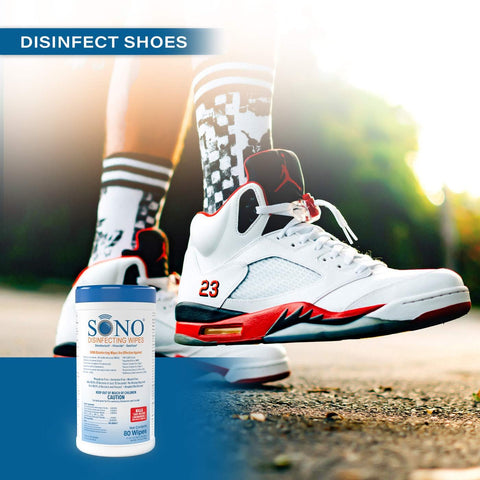 Person in sneakers with Alcohol-Free Disinfecting Wipes No Bleach Medical-Grade Multi-Surface Cleaning canister