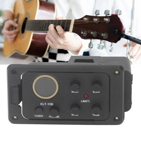 Musician playing guitar with 4 Band EQ Preamp for Acoustic Guitar with Piezo Pickup and Built In Tuner LCD Display in foreground