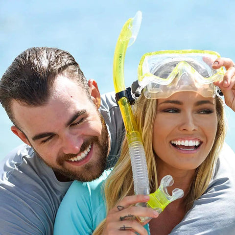 Couple enjoying beach with Vapor Semi Dry Snorkel For Snorkeling Mask And Underwater Breathing Gear With Purge Valve Easy Breathing