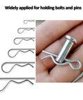 Close-up of zinc-plated steel R clip from 24 Piece Cotter Pin Assortment Kit with R Clips Heavy Duty Zinc Plated Spring Fasteners for Auto Repairs