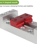 Nifty Mini Bench Vise Featuring Slick Bottom Slider And Precision Flat Jaws For Drill Press Work No Sweat Clamp Lock Solid 50mm Clamping Range close-up of cross V-shaped mouth design with red jaws for improved stability.