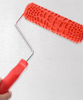 Decorative Textured Wall Paint Roller With Ergonomic Handle Creates Realistic Wood Grain Effects Dry Emboss Plaster Design For Diy Home Project To Nail That Wood Look on a white surface.