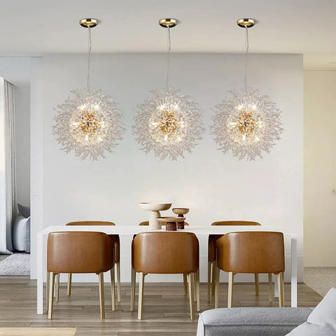 Gold 12 Light Modern Crystal Firework Chandelier With Dandelion Burst Design in dining room with white table and brown chairs