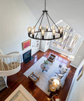 12 Light Black Wagon Wheel Chandelier For Dining Rooms And Kitchen Islands Dimmable Cozy Rustic Farmhouse Pendant Lighting With 12 E26 Sockets Ideal For High Ceilings Foyer Living Room And Porch in modern living room view from above