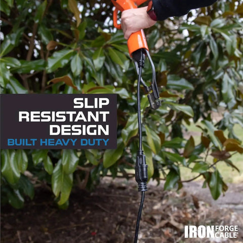 Lighted 25 Ft Outdoor Extension Cord Heavy Duty 10/3 SJTW Black Cable With 3 Prong Grounded Plug in outdoor setting.