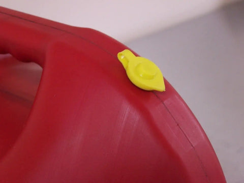 10 Pack Universal Large Yellow Gas Can Vent Caps For Plastic Fuel Cans installed on red plastic fuel can