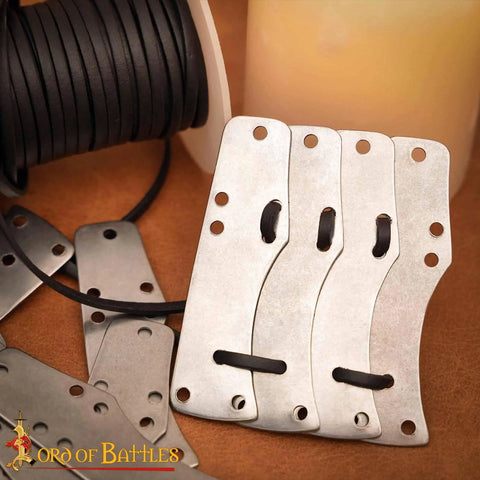 Close-up of Beefy Steel Lamellar Armor Plates Set Of 100 For Reenactments 20 Gauge Craft Scale Medieval Armor showing detail and stringing