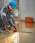 Worker using Professional Cordless Angle Grinder Runs Smooth And Hits Hard With Multi Volt Battery Interface on steel rebar.