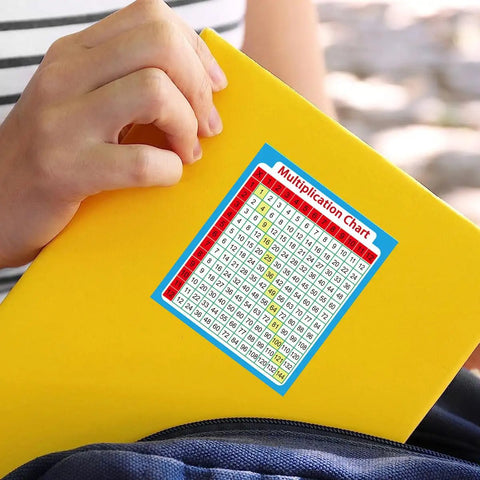 Multiplication Chart Stickers 3 By 3 And A Half Inch Kid Friendly Learning Labels For Kids on yellow notebook