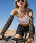 Kick Butt In The Dog Days Of Summer With Steampunk Mechanical Gear Ice Silk Arm Sleeves on a cyclist's arms outdoors.
