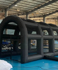 Inflatable Tennis Court Style Tent And Baseball Batting Cage With Blower Portable 19.68 Ft By 9.84 Ft in warehouse setup