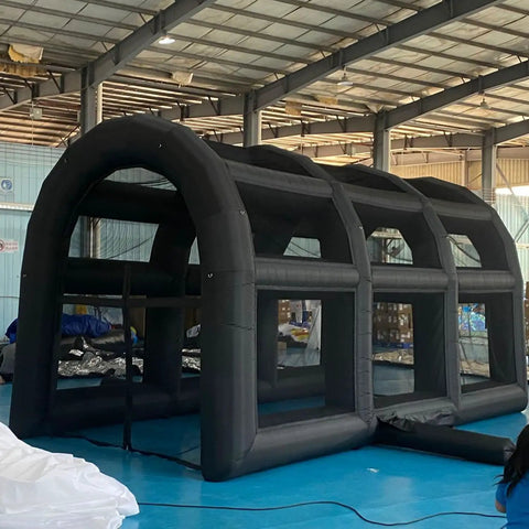 Inflatable Tennis Court Style Tent And Baseball Batting Cage With Blower Portable 19.68 Ft By 9.84 Ft in warehouse setup