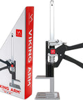Viking Arm handheld jack/clamp with black lever and silver vertical post, shown beside its red packaging box.