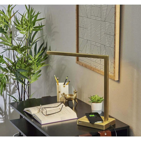 Aidan LED Wireless Charging Desk Lamp With Built In 5W Qi Pad on office desk with book and plant