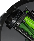 Close-up of a Roomba with 2 Piece Replacement Tire Set for S9 J7 500 600 700 800 900 E and I Series Robots Anti Slip Wheel Tires installed