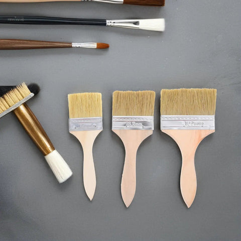 Do It All Three Piece Wood Handle Paint Brush Set With Natural Bristle For Walls, Furniture, Decks And Stain Jobs displayed on table