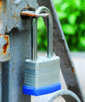Outdoor gate secured with Two Pack Heavy Duty Padlocks Keyed Alike With Extra Long Two And Three Eighths Inch Shackle And Forty Millimeter Laminated Steel Lock Bodies Ideal For Gym Lockers Sheds Gates Warehouses Tool Boxes Hasps Includes Four Identical Keys