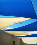 Blue Sun Shade Sail Right Triangle 8x8x11.3 Ft Built Tough UV Blocking Fabric installed over patio, blocking sunlight.