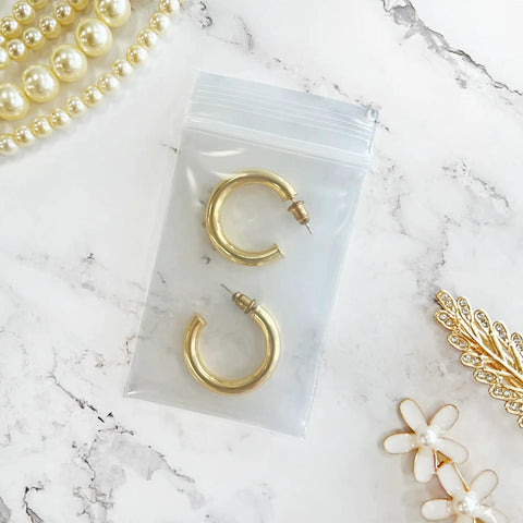 Heavy Duty 2x3 Inch 6 Mil Zipper Reclosable Bags Clear LDPE Food Storage Pack of 200 Two Packs of 100 Ideal for Small Parts Crafts Snacks and Quick Organization, clear bag with gold hoop earrings