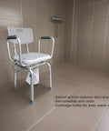 360 Degree Swivel Shower Chair With Back Support, Adjustable Height 20 To 25 Inches in a tiled bathroom, highlighting arm rests.