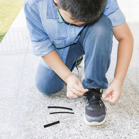 Super Cool 78 Piece Shoe Lace Tips Kit For DIY Shoe Repair And Shortening With Plastic Heat Shrink End Caps To Extend Lace Life And Keep Casual Kicks Looking Fresh Without Buying New Gear, boy tying sneaker laces