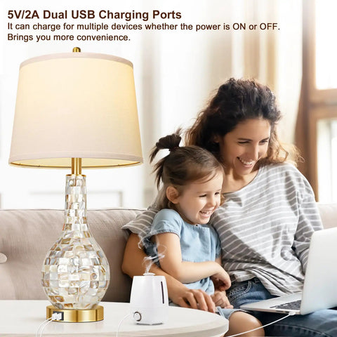 Gold Table Lamps Set Of 2 For Living Room With Shell Tile Inset shown with USB charging next to a mother and child on sofa.
