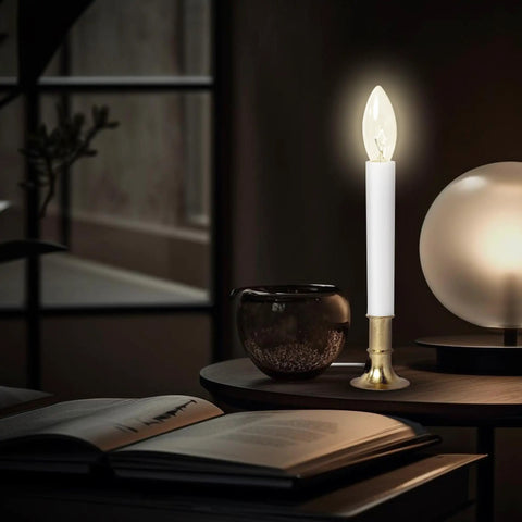 Replacement Light Bulbs For Electric Candle Lamps And Chandeliers No Fuss Easy Fit E12 Candelabra Base lit on table
