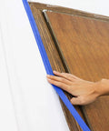 Blue Painters Tape Set With Four Sizes One Half Inch, Three Quarter Inch, One Inch And Two Inch, 60 Yards Each, applied on wooden edge
