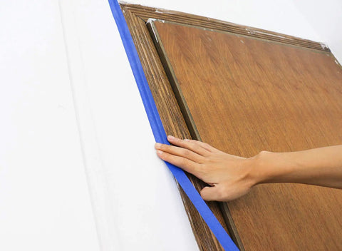 Blue Painters Tape Set With Four Sizes One Half Inch, Three Quarter Inch, One Inch And Two Inch, 60 Yards Each, applied on wooden edge