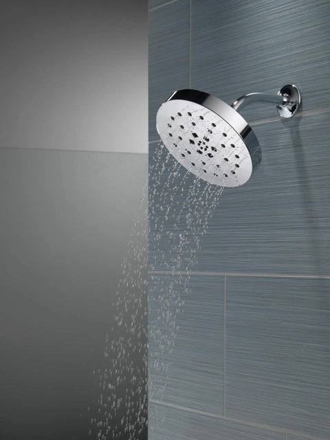 Shower Head With H2Okinetic Technology, 4 Setting UltraSoak Drench Spray, Rainfall Like Coverage, polished nickel on tiled wall